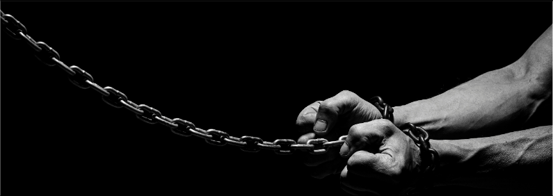 Two hands tightly bound by a thick metal chain against a dark background.