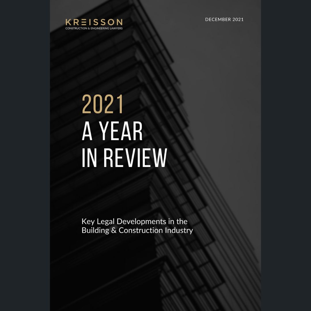 Cover of a report titled "2021 A Year in Review: Key Legal Developments in the Building & Construction Industry" by Kreisson, dated December 2021, with a building in the background.