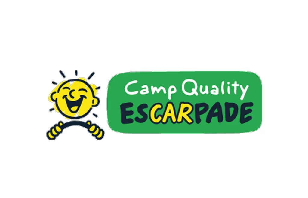 Logo showing a smiling cartoon face holding a steering wheel beside the text "Camp Quality ESCarPADE" on a green background.