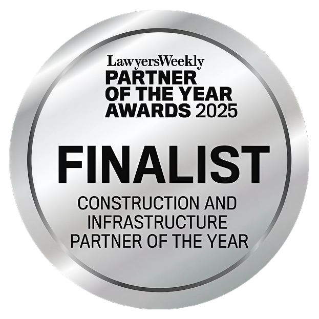 Silver circular badge displaying "Lawyers Weekly Partner of the Year Awards 2025 Finalist, Construction and Infrastructure Partner of the Year.
